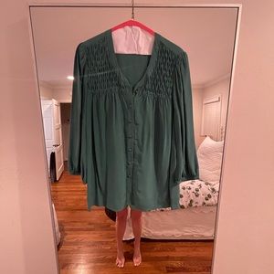 Green silk blouse